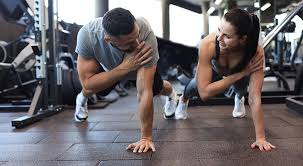 Toning Bingo Wings: Your Ultimate Guide to Sculpting Sleek Arms at the Gym 3 Fitness trainer demonstrating arm toning exercises Sunbury