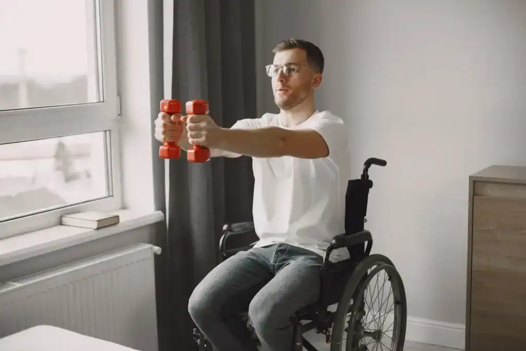 Image of man doing exercise in his wheelchair to aid weight loss Sunbury