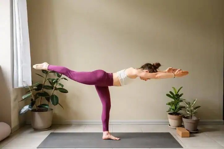 Woman doing Yoga exercise Sunbury to help with toning the body. 