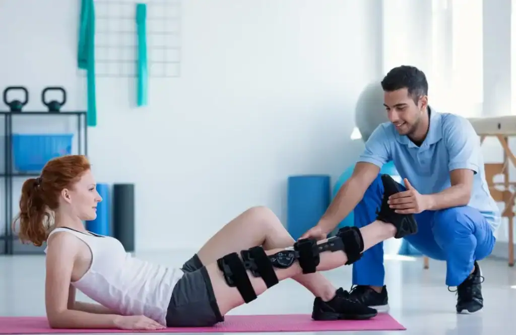Debunking Meal Timing Myths: The Truth About Muscle Recovery 1 Woman having treatment to help muscle recovery Sunbury after an injury